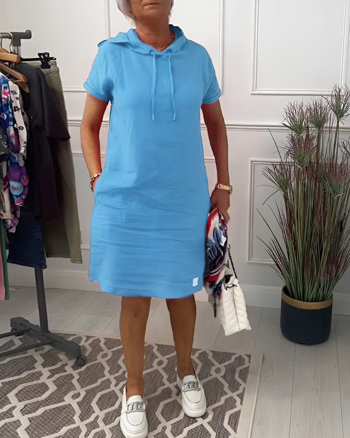 Women's relaxed fit midi dress, hoodie style with adjustable hood for ultimate comfort and casual look.