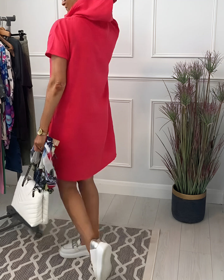 Comfortable women's relaxed fit hoodie dress, a stylish midi with adjustable hood for casual fashion.
