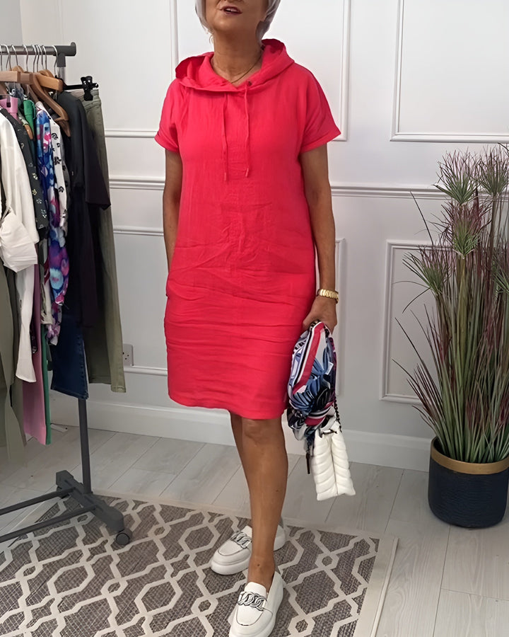 Relaxed fit women's midi hoodie dress, a comfortable casual style with an adjustable hood.