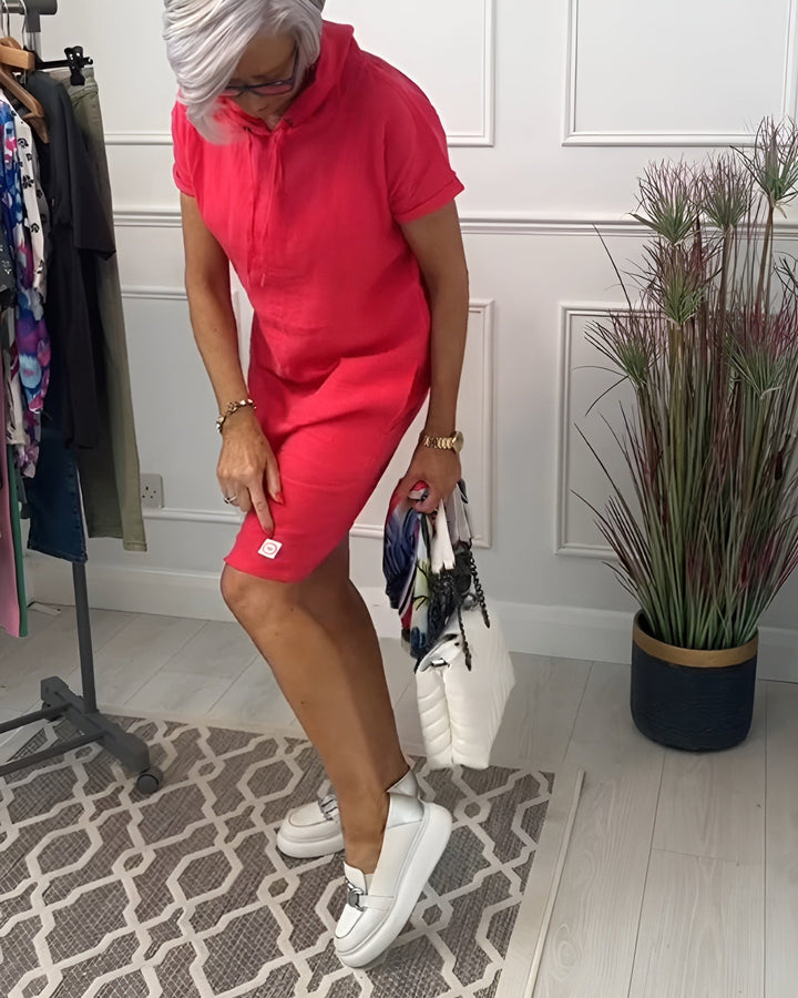 Stylish women's midi hoodie dress for everyday comfort, featuring a relaxed fit and adjustable hood.