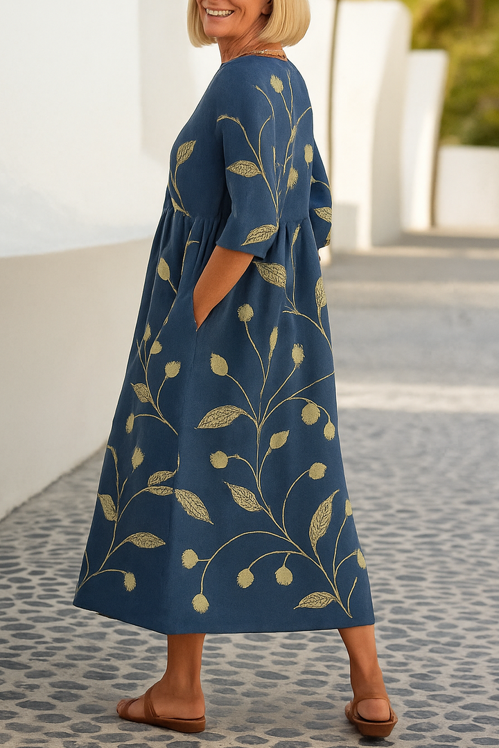 Women's relaxed fit midi dress with comfortable 3/4 sleeves, perfect for everyday casual wear.