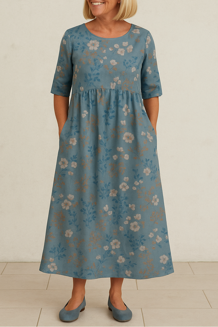 Comfortable women's relaxed midi dress with 3/4 sleeves, a versatile choice for everyday wear.