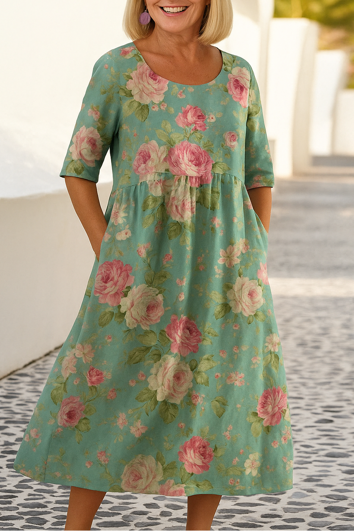 Elegant women's relaxed midi dress featuring 3/4 sleeves, great for versatile spring casual outfits.