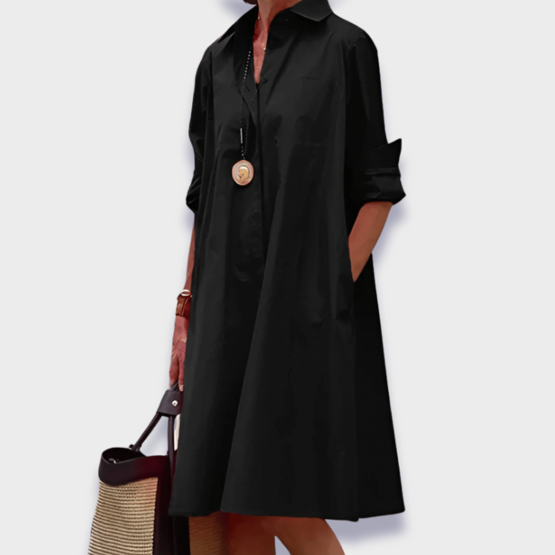 Chic women's button-up midi shirt dress in a relaxed, flowy style with pockets, perfect for summer casual elegance.
