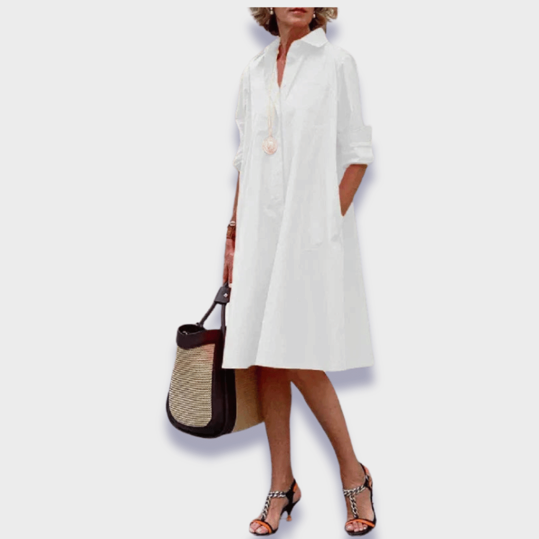 Elegant women's collared midi shirt dress featuring a relaxed button-up design, pockets, and versatile for day-to-night.