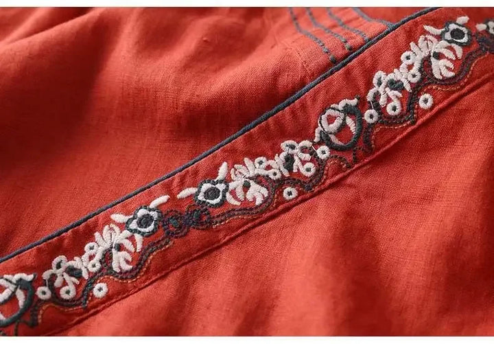 Pink patterned v-neck blouse. Comfortable women's relaxed fit top for ladies.