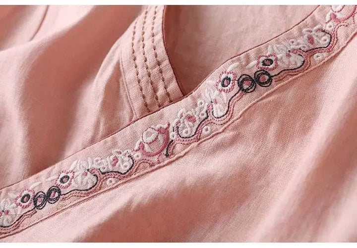 Lightweight patterned v-neck blouse for summer. Women's relaxed fit elegance.