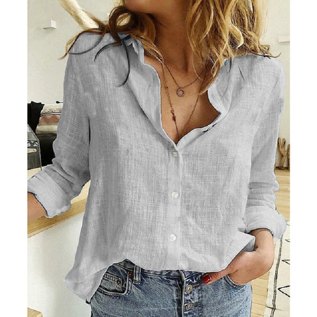 Chic women's point collar blouse with relaxed fit, perfect for versatile year-round styling.