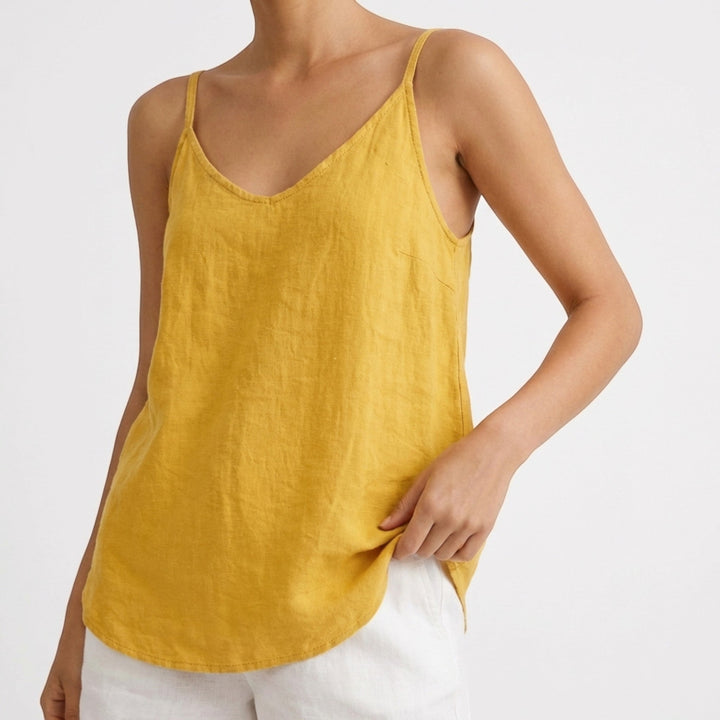 Women's relaxed spaghetti strap tank, ideal summer top for beach, casual outings.