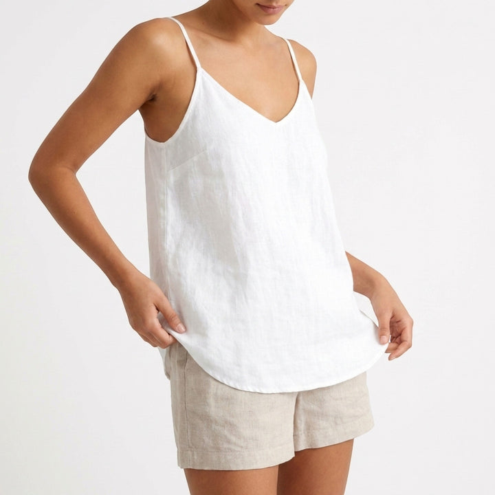 Effortless women's relaxed tank top with thin spaghetti straps, great for summer fashion.