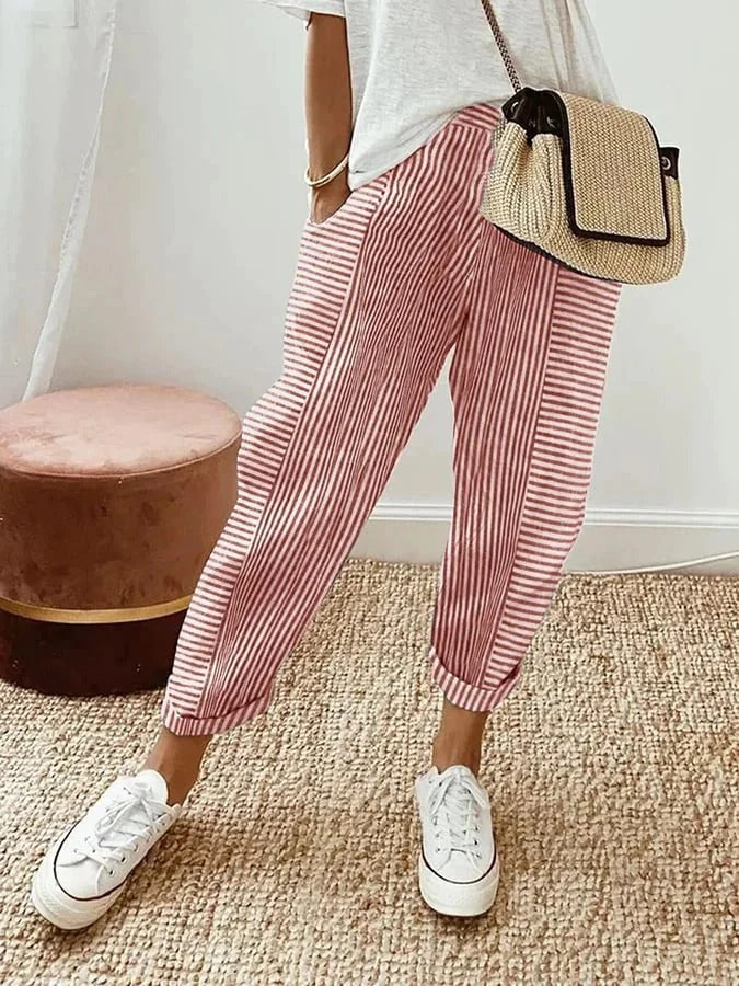 Comfortable women's striped loungewear pants featuring a flexible drawstring.