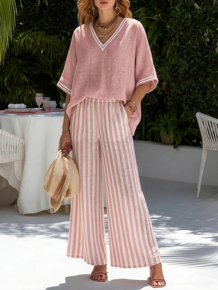 Women's relaxed fit striped two-piece set with a v-neck top and wide-leg pants, perfect for summer casual wear.