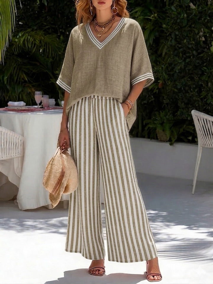 Stylish women's relaxed striped co-ord set with a comfortable v-neck blouse & flowing wide-leg trousers.