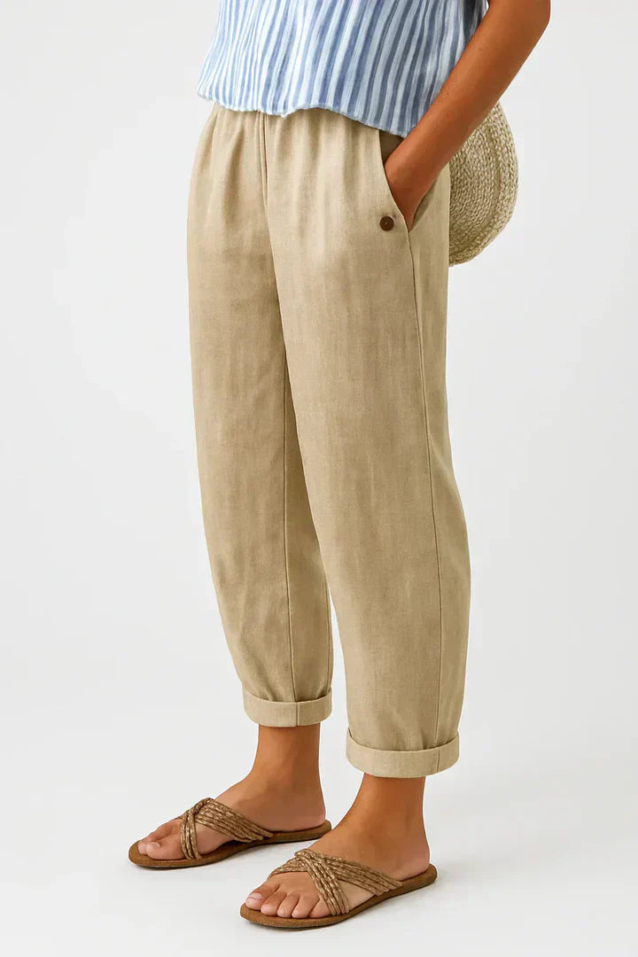 Women's relaxed fit trousers with elastic waist, perfect for everyday comfort and casual style.