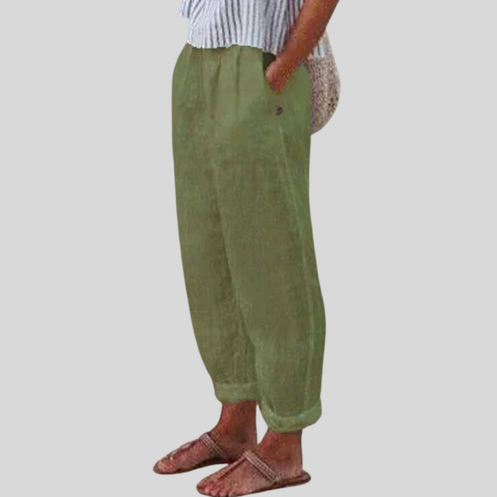 Chic women's relaxed fit folded hem trousers, versatile for smart casual or everyday summer fashion.