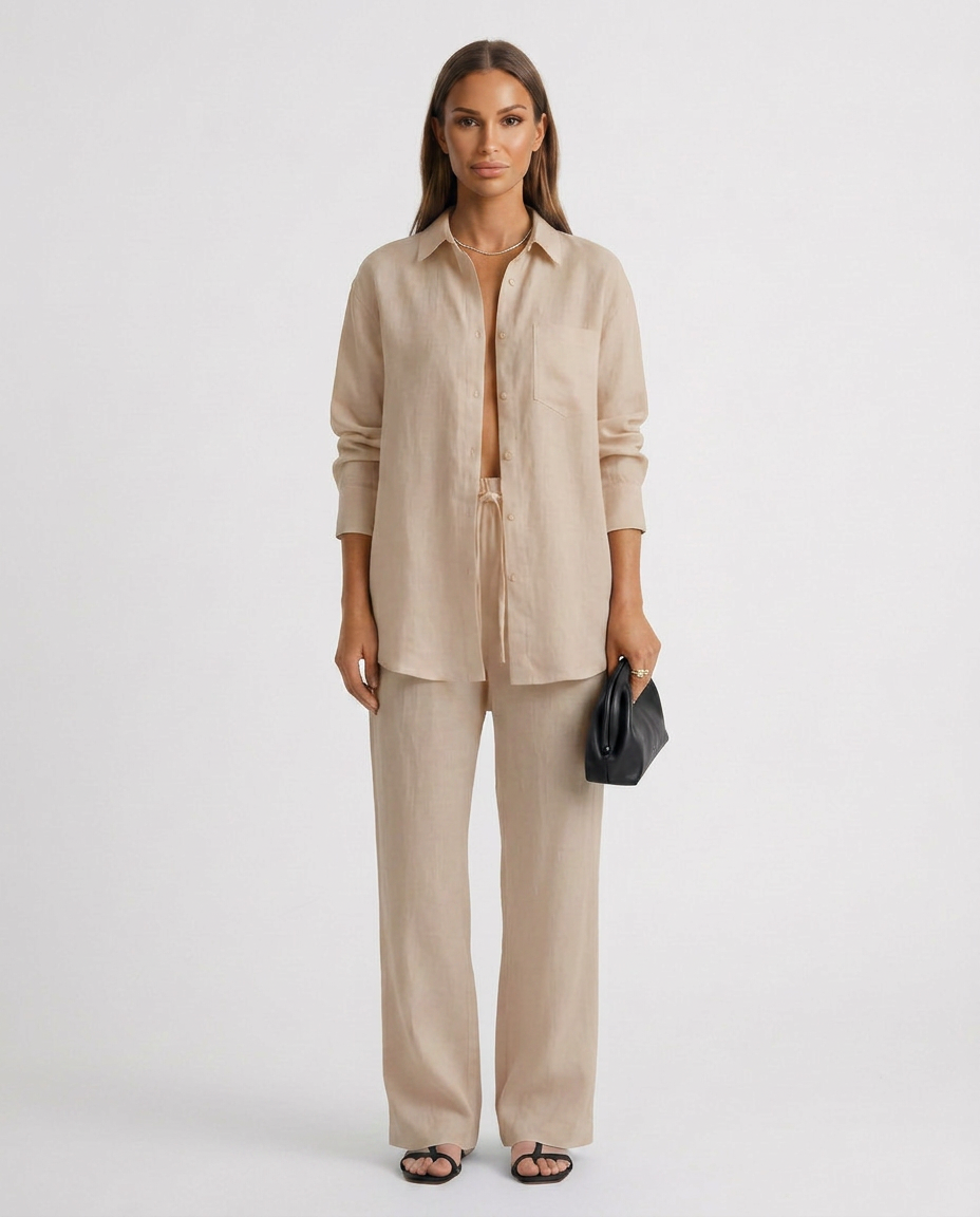Women's relaxed fit two-piece lounge set in soft fabric. Perfect for casual comfort & leisure.