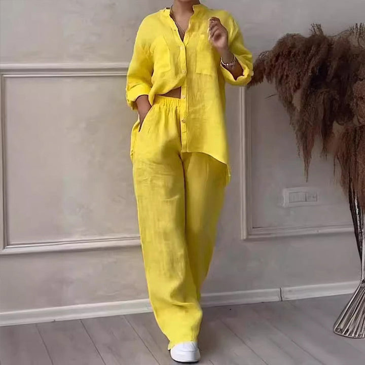 Stylish women's matching outfit with a comfortable button down shirt and flowy wide leg pants.