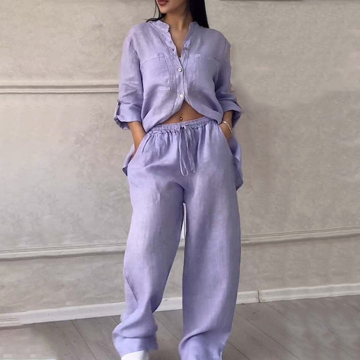 Elegant women's two piece outfit, a relaxed shirt and wide leg pants for a sophisticated yet casual look.