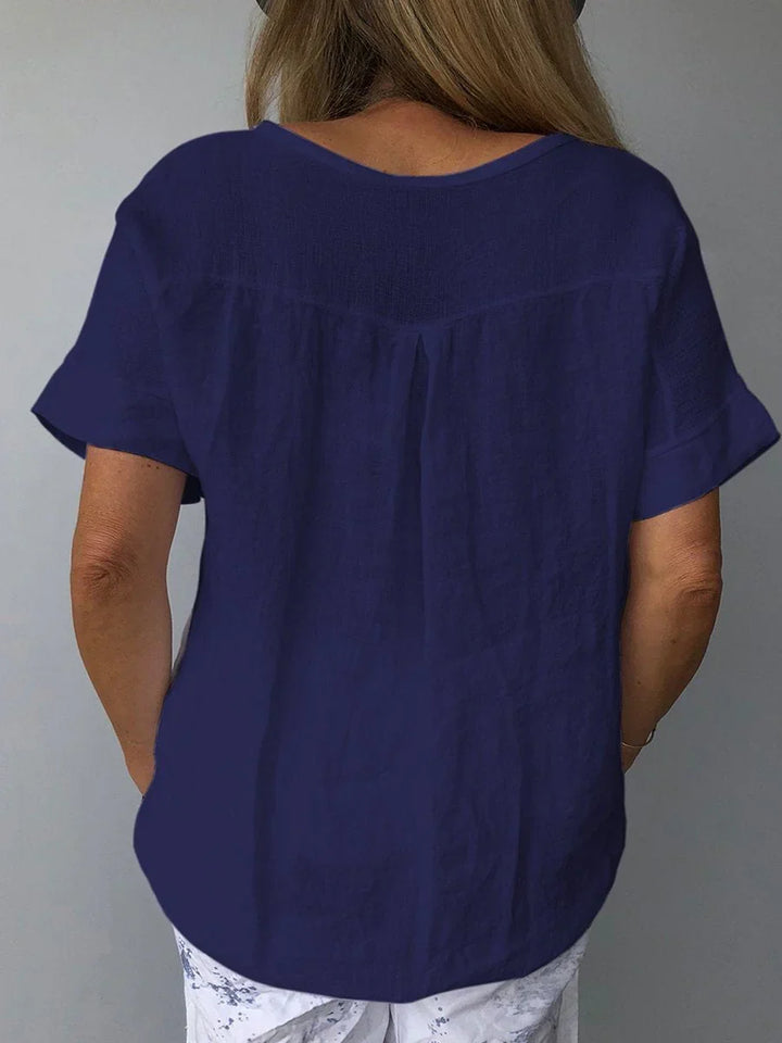 Comfortable women's V-neck summer blouse with a relaxed fit for versatile everyday wear.
