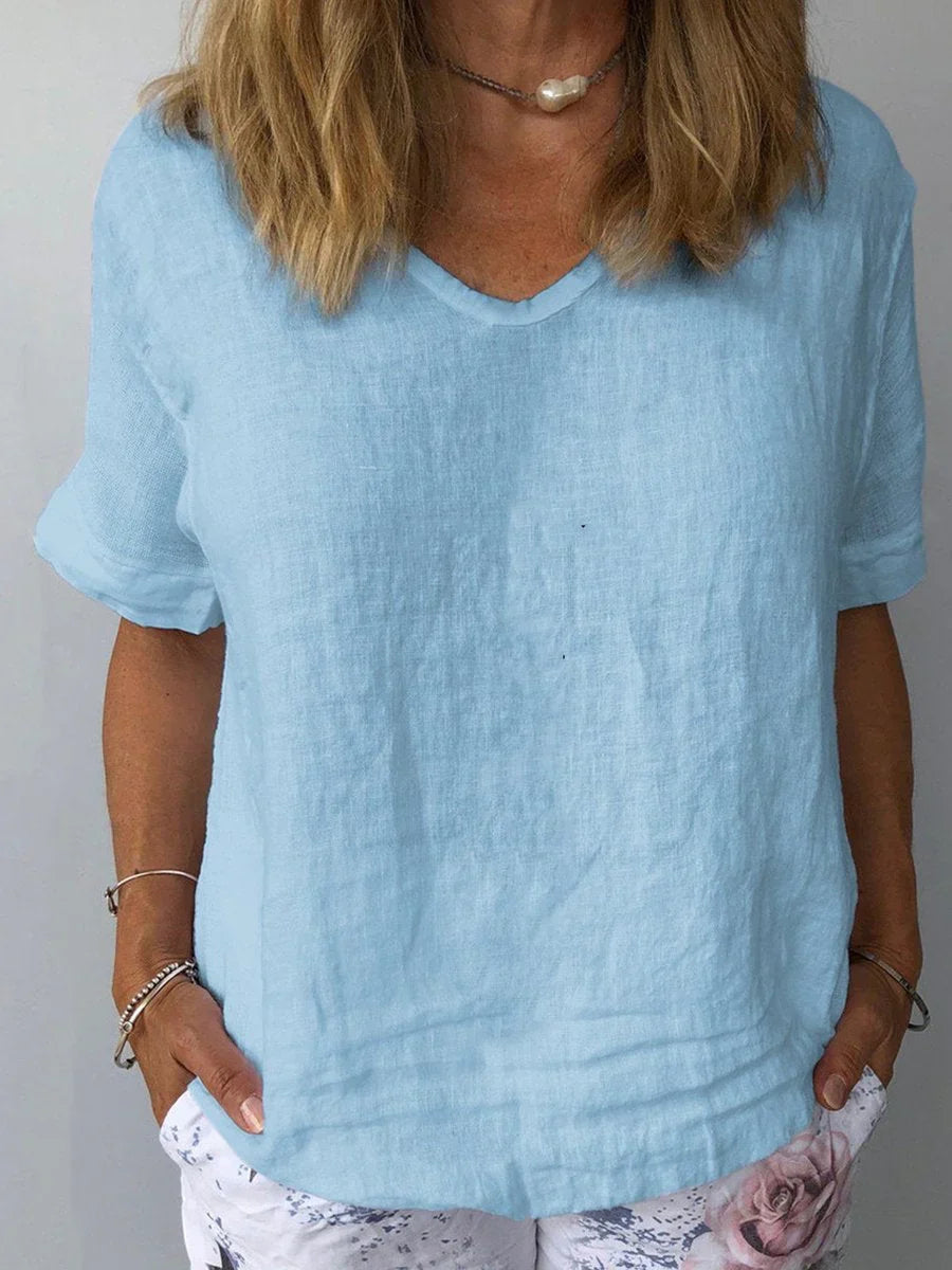 Relaxed fit V-neck short sleeve top for women, perfect for comfortable and casual everyday style.