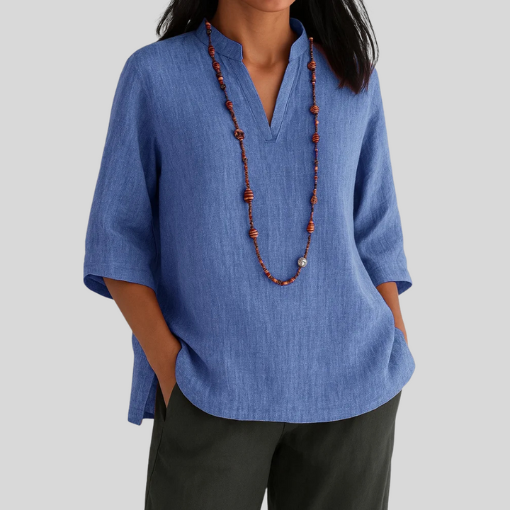 Elegant women's V-neck blouse with 3/4 sleeves, a relaxed fit casual top for versatile daily wear & fashion.