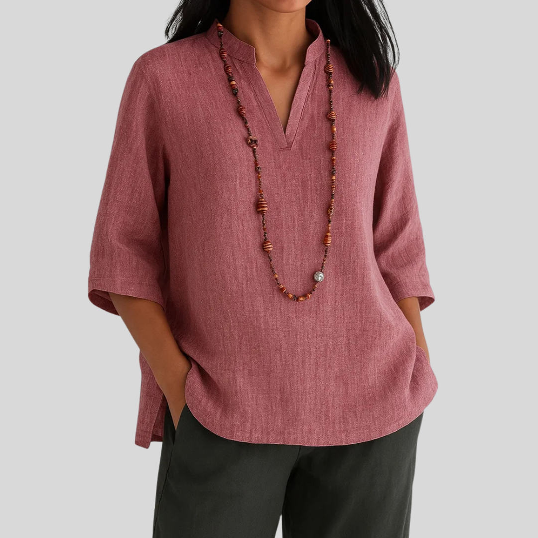 Women's V-neck 3/4 sleeve blouse, relaxed fit. A versatile, elegant women's apparel top for casual or daily wear.