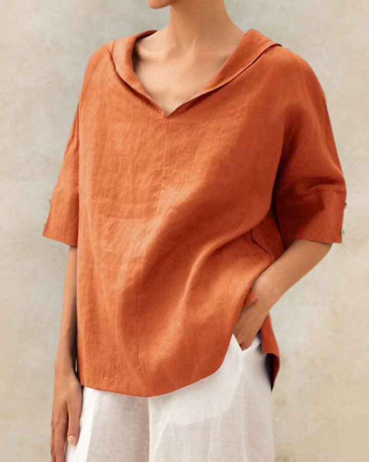 Versatile women's short sleeve V-neck top, relaxed fit blouse for casual style and everyday comfort.