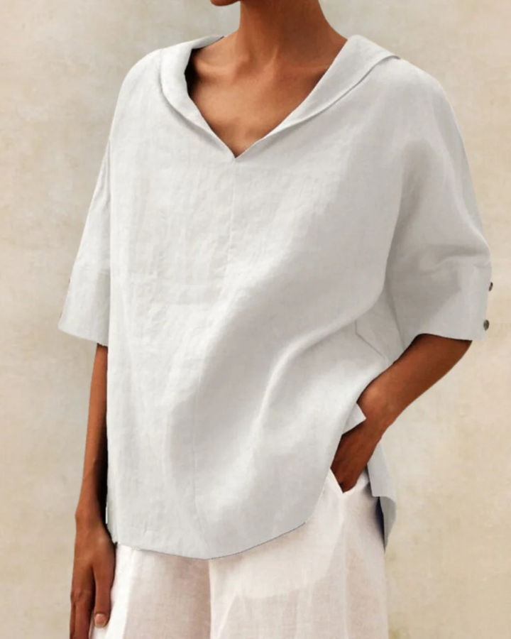 Women's casual V-neck blouse with short sleeves, a comfortable loose fit top for versatile daily wear.