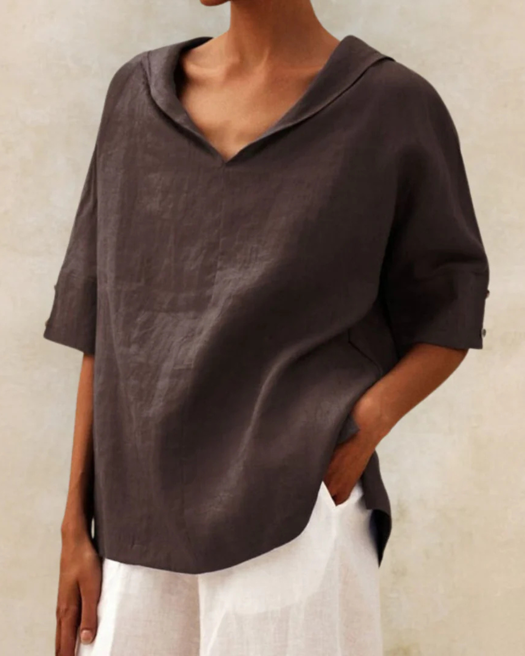 Relaxed fit women's short sleeve V-neck blouse, a comfortable & stylish top for everyday summer fashion.