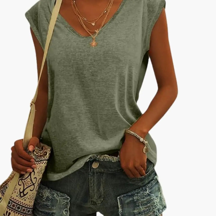 Women's relaxed fit V-neck sleeveless top in white, perfect for casual summer everyday wear.