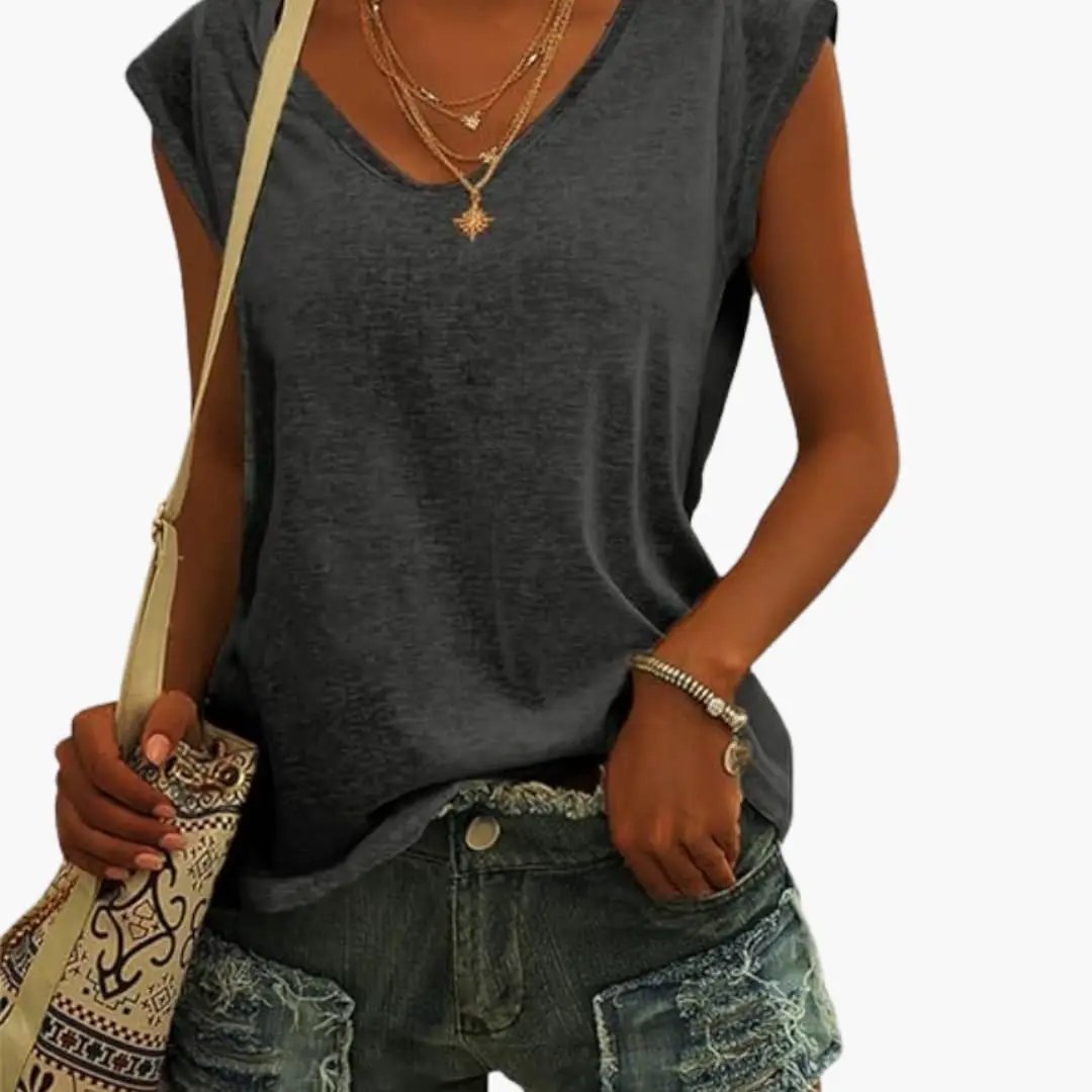 Versatile women's sleeveless V-neck tunic top, a stylish and comfortable choice for any casual outfit.