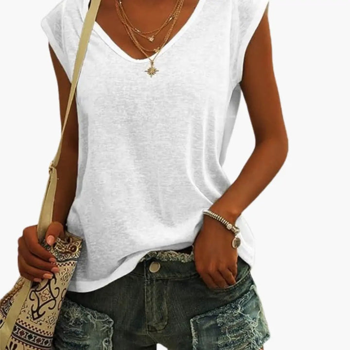 Model wearing a relaxed V-neck sleeveless top, showcasing its comfortable and versatile everyday style.