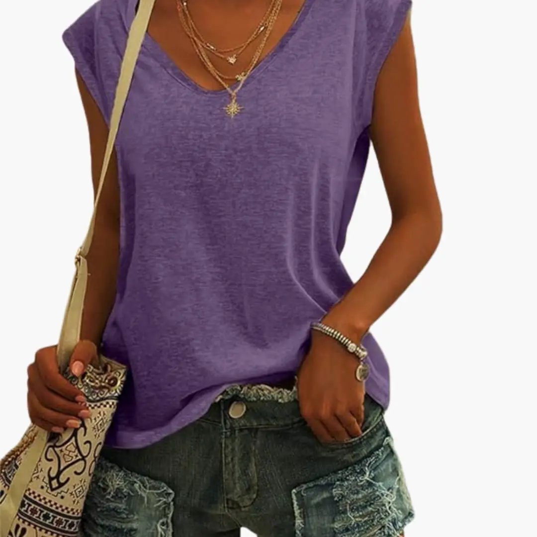 Close-up of the fabric texture on a women's V-neck sleeveless top, highlighting its soft, comfortable feel.
