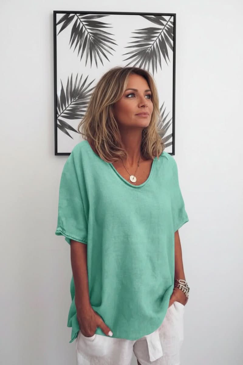 Women's V-neck blouse, relaxed fit for summer. Lightweight & breathable for ultimate comfort & style.