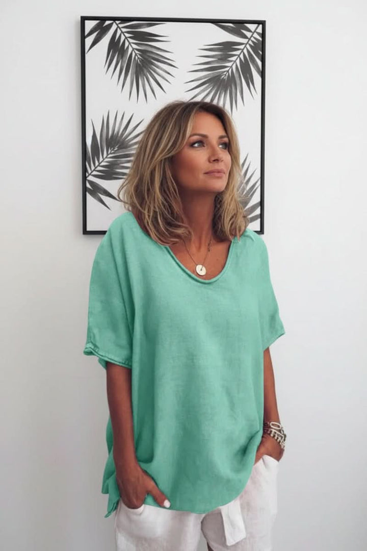 Women's V-neck blouse, relaxed fit for summer. Lightweight & breathable for ultimate comfort & style.