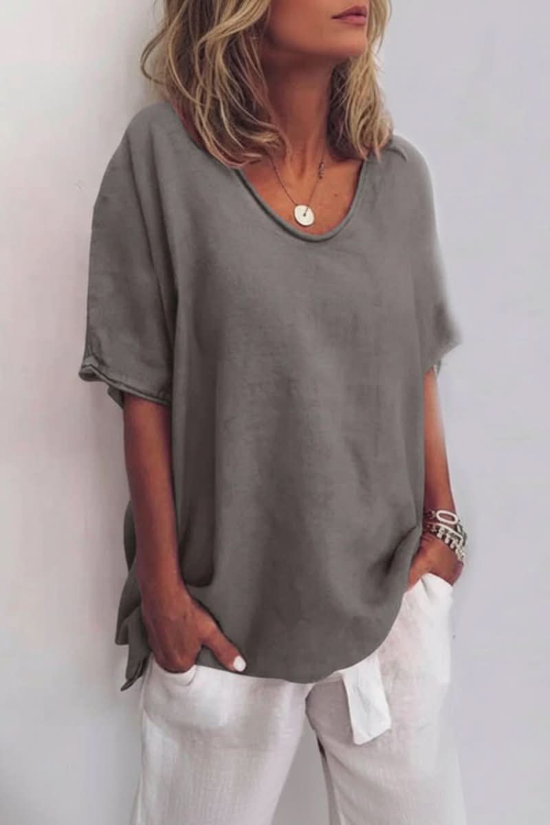 Summer V-neck blouse for women, relaxed fit design for breathable comfort & casual beach style.