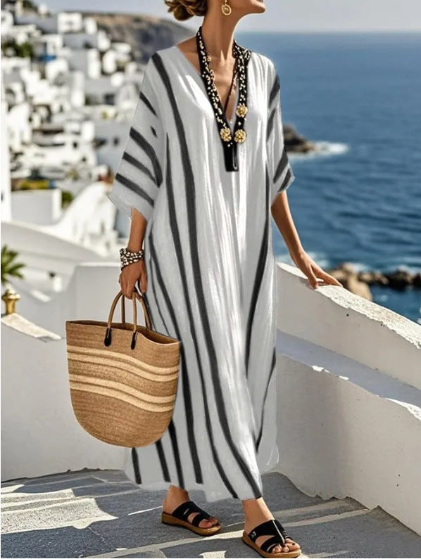 Lightweight women's flowy kaftan maxi dress, perfect as a casual beach cover-up or elegant resort wear.