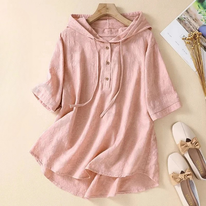 Comfortable women's relaxed fit hooded blouse, versatile top for casual chic and everyday fashion.