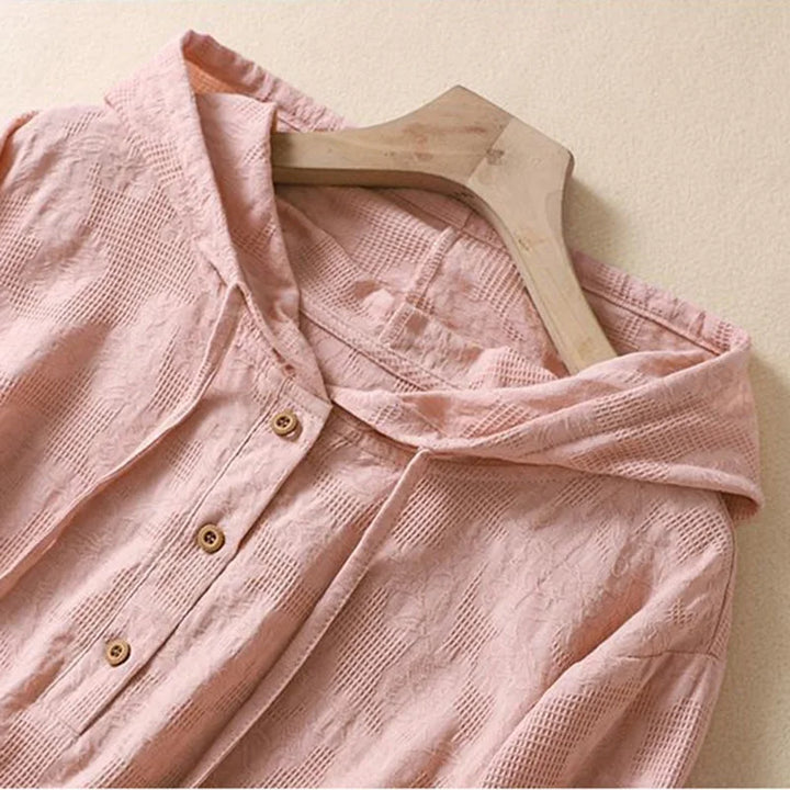 Effortless women's relaxed hooded blouse, ideal for casual style and comfortable everyday wear.