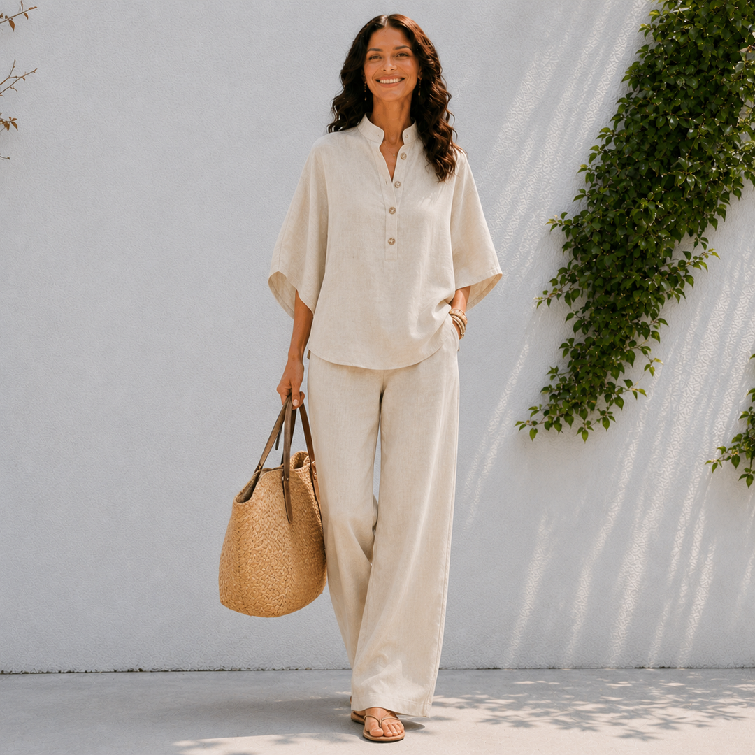 Women's relaxed oversized blouse & wide leg pants set. Comfortable two-piece for summer casual wear.