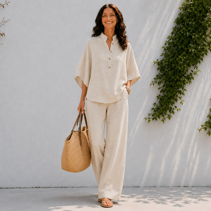Women's relaxed oversized blouse & wide leg pants set. Comfortable two-piece for summer casual wear.