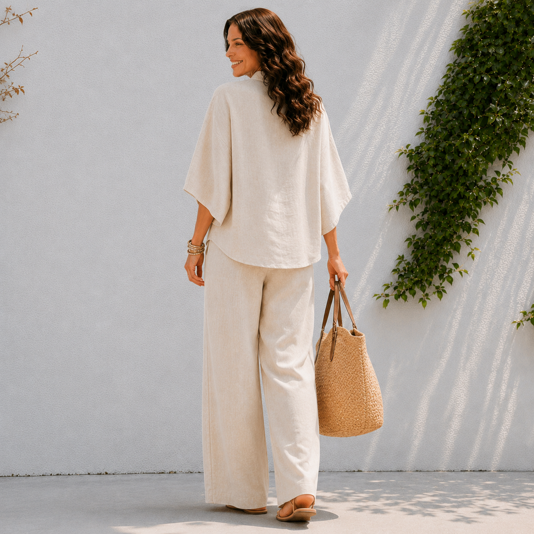 Chic women's two-piece set: oversized blouse & wide leg pants. Perfect for travel fashion & resort wear.
