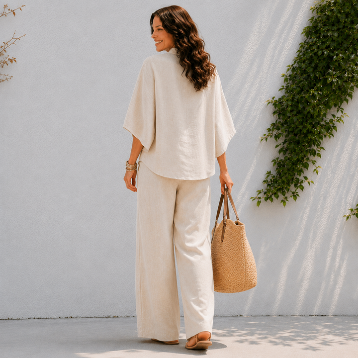 Chic women's two-piece set: oversized blouse & wide leg pants. Perfect for travel fashion & resort wear.