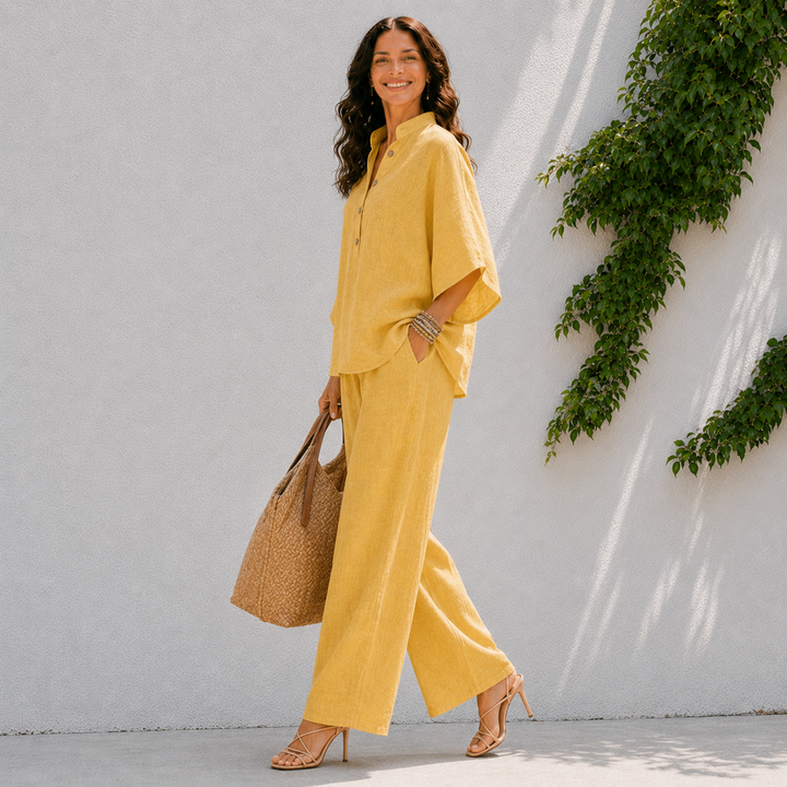 Comfortable chic women's set featuring a relaxed oversized blouse & flowy wide leg pants. Everyday elegance.