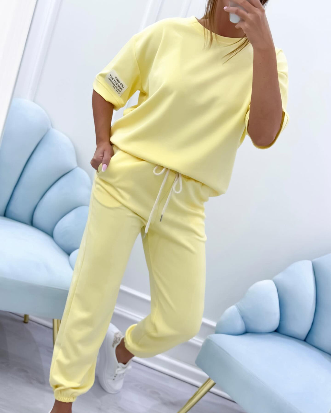 Plus size women's relaxed short sleeve set, a comfortable two-piece casual outfit for summer days.