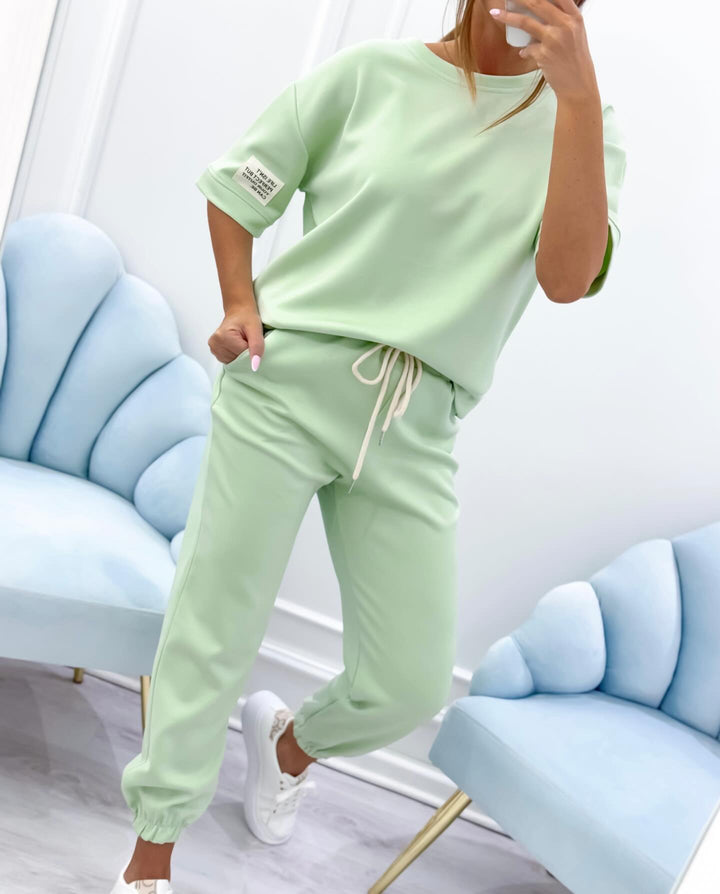 Women's comfortable relaxed fit short sleeve two-piece set for casual summer wear & daily lounging.