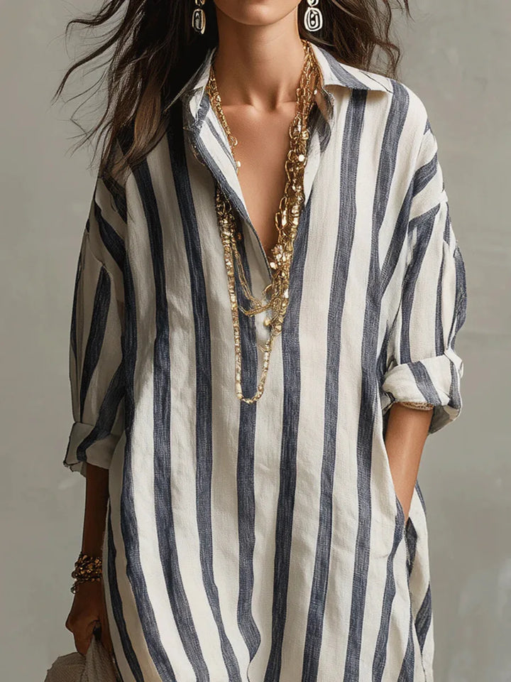 Comfortable women's relaxed fit striped maxi shirt dress with V-neck & pockets, everyday style.