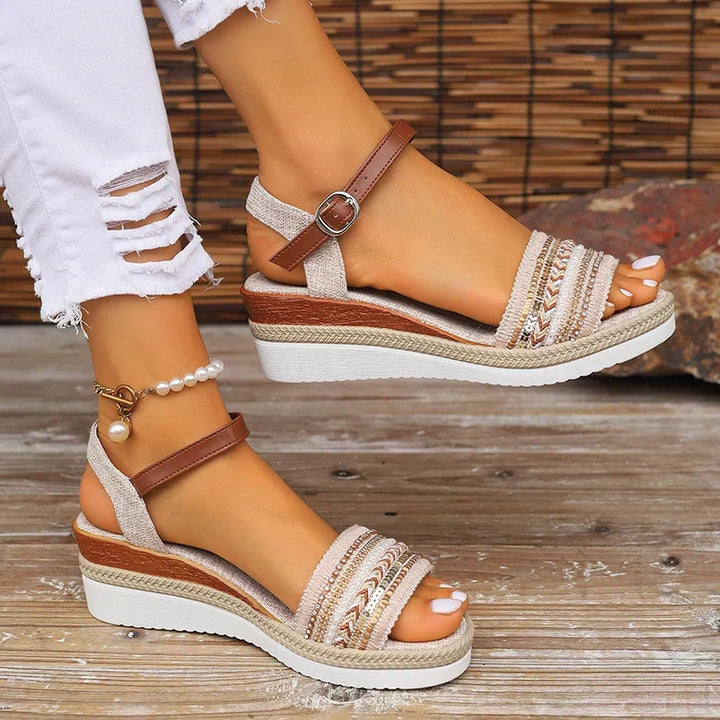 Women's relaxed summer sandals for all-day comfort. Flat, casual footwear with adjustable strap.