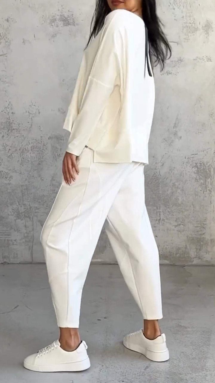 Stylish women's relaxed two-piece set, a chic casual outfit with long sleeves and round neck.