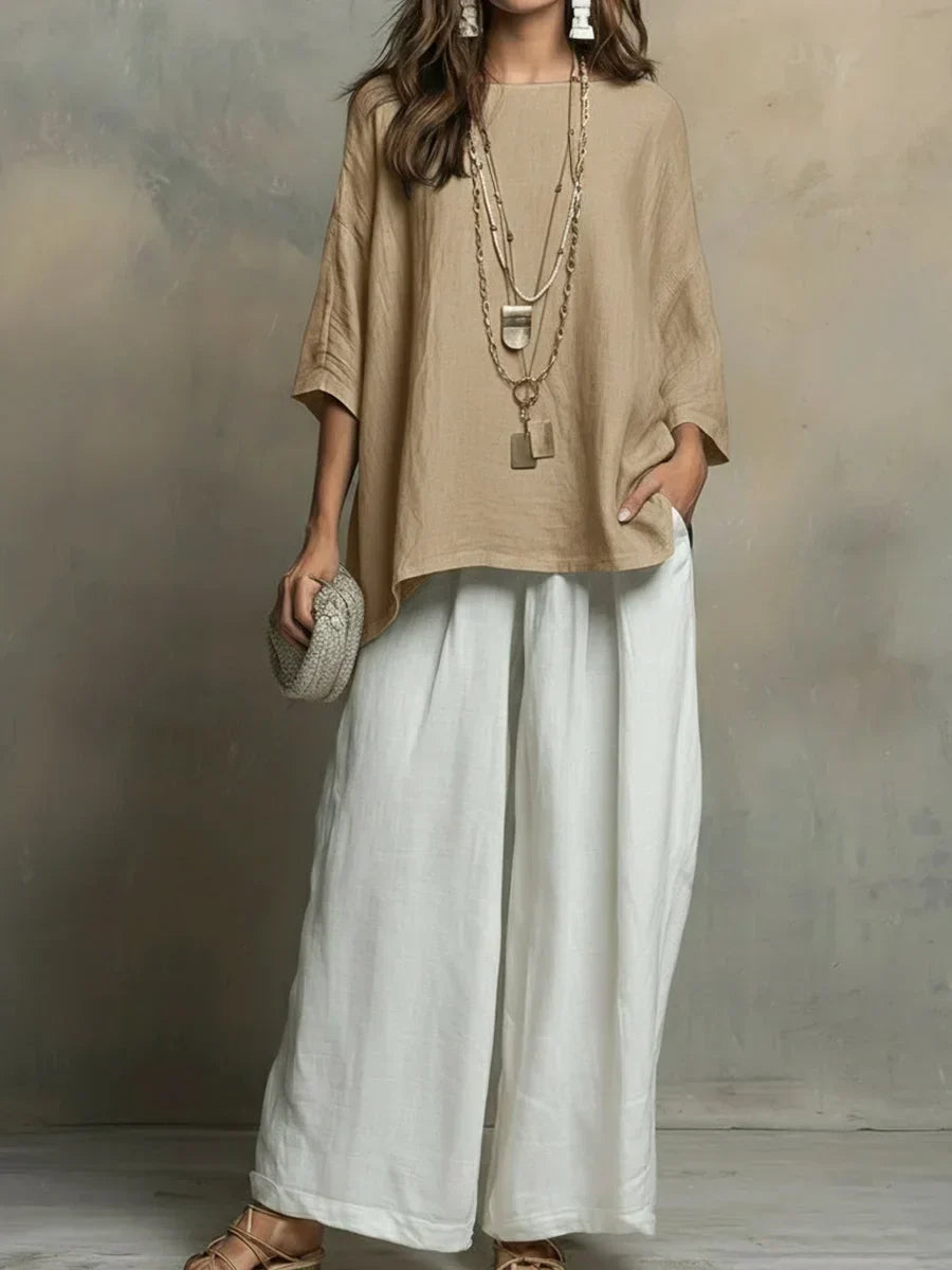 Comfortable women's two-piece loungewear set. Relaxed fit, wide leg pants & casual top for everyday or vacation.